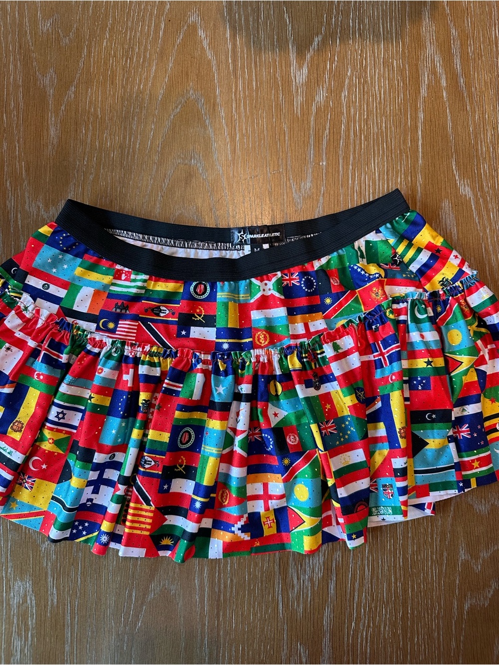 Sparkle Athletic World Flags Skirt Size Medium; BNWT.